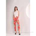 Pantalones de tobillo con estampado floral tropical para mujer